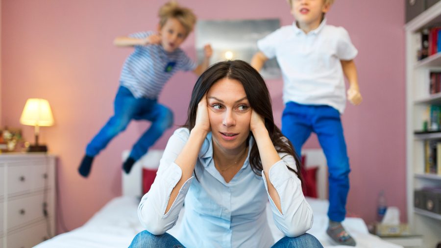 Frustrated mother with children